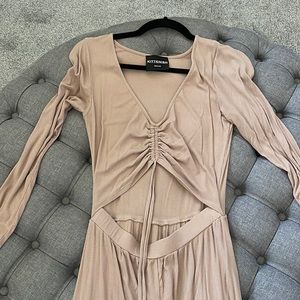 Kittenish tan jumpsuit.